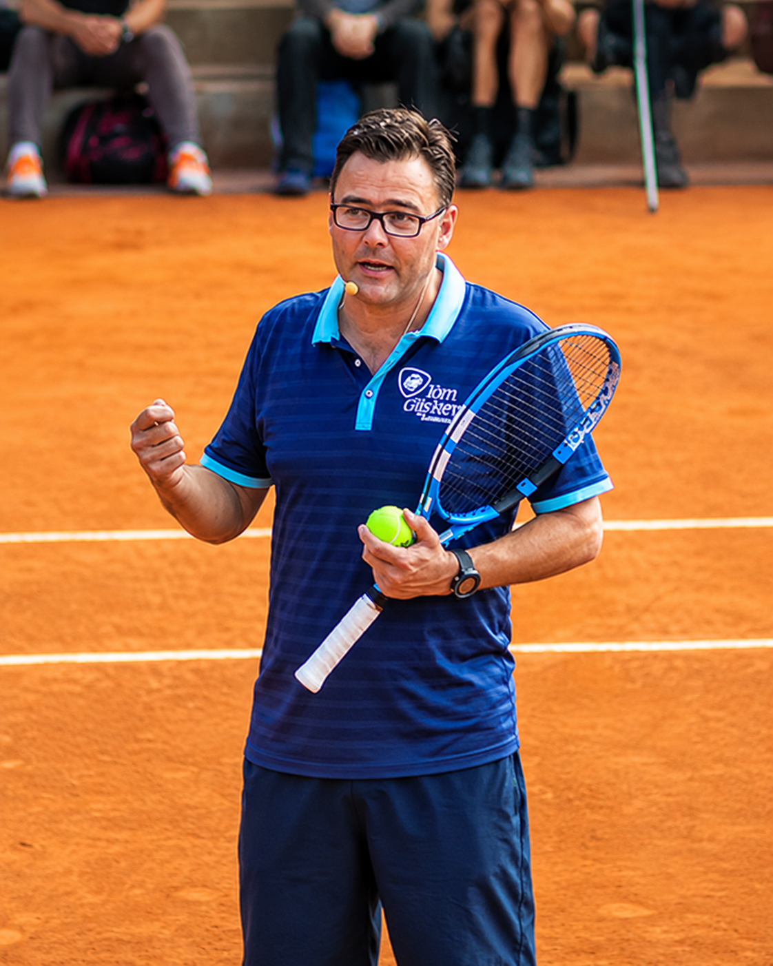 Carl Maes, tennis coach and speaker, courtside